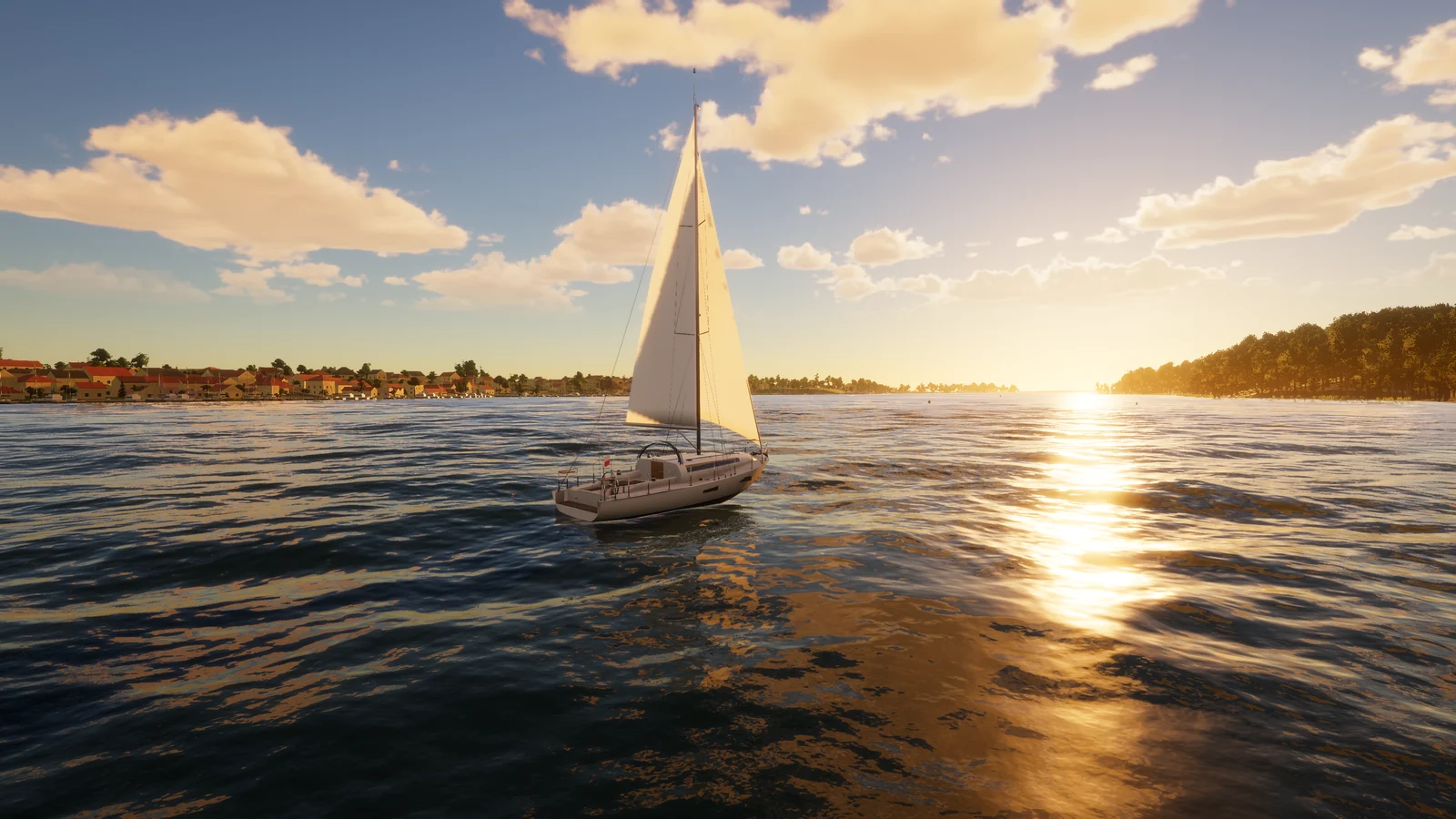A cruiser under sail at golden hour
