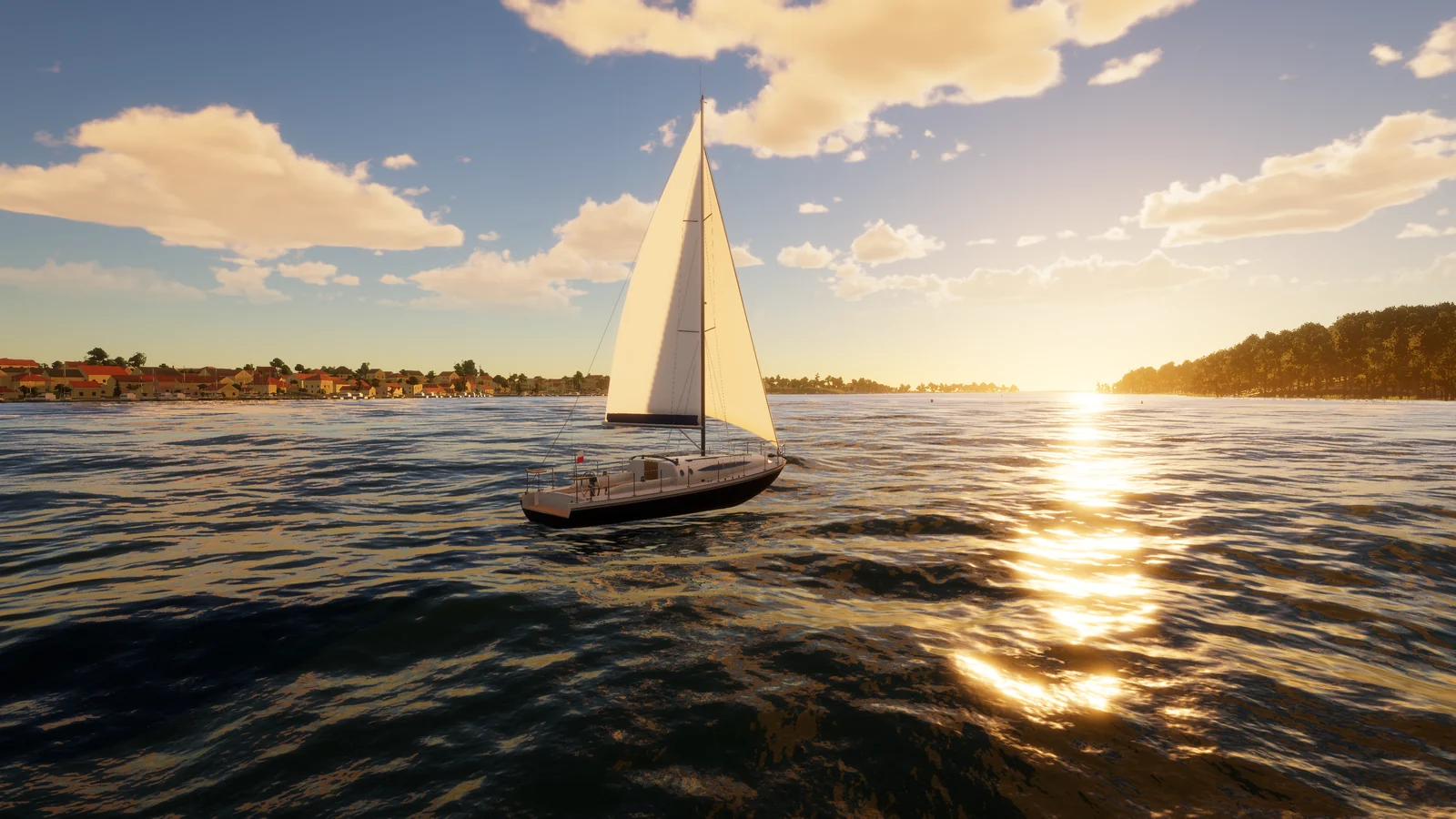A larger cruiser under sail at golden hour