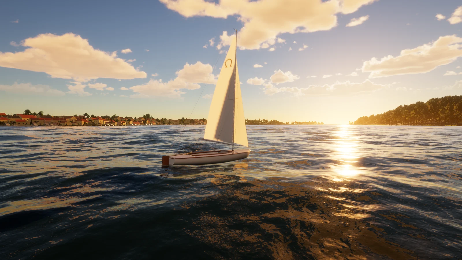 An open dinghy under sail at golden hour