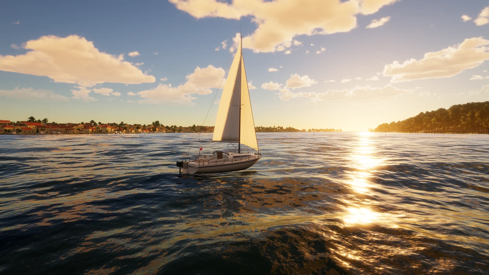 A small cabin boat under sail at golden hour
